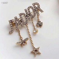 Wisiorki Christian Dior z motywem pszczoły, gwiazdy i koniczyny, zdobione diamentami, w kolorze antycznego złota, z kryształkami, w kolorze złota
