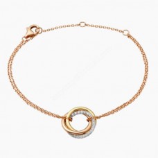 Bransoletka Cartier Trinity z białego złota/żółtego złota/różowego złota z diamentami