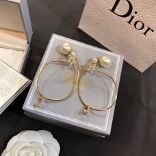 Kolczyki z wisiorkiem w kształcie koła z diamentami w kolorze białym i żółtym złotem Christin Dior