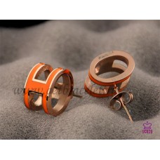 Kolczyki Hermes Pop H Orange w różowo-złotym kolorze