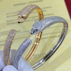Bransoletka Panthere de Cartier z onyksu i szmaragdów z diamentami, żółte złoto/różowe złoto/białe złoto