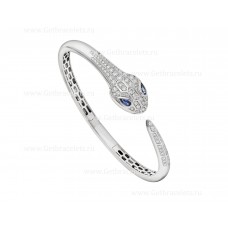 Bransoletka Bvlgari Serpenti Bangle z 18-karatowego białego złota z niebieskimi szafirowymi oczami i diamentami Bransoletka Bvlgari Serpenti Bangle z 18-karatowego białego złota z niebieskimi szafirowymi oczami i diamentami