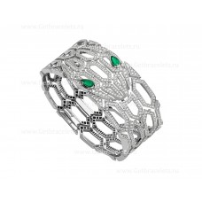 Bransoletka Bvlgari Serpenti Bangle z 18-karatowego białego złota z szmaragdowymi oczami i pełnym diamentowym wysadzaniem Bransoletka Bvlgari Serpenti Bangle z 18-karatowego białego złota z szmaragdowymi oczami i pełnym diamentowym wysadzaniem