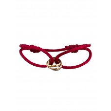Bransoletka Cartier Trinity z czerwonym sznurkiem
