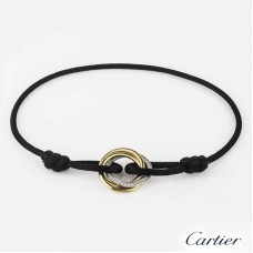 Bransoletka Trinity de Cartier ze złota 18k z diamentami i czarną bawełną