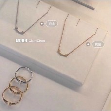 Naszyjnik z wisiorkiem Tiffany Co. T Smile Diamonds w kolorze srebra, różu i żółtego złota dla kobiet