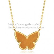 Van Cleef Arpels Lucky Alhambra Butterfly Pendant z żółtego złota z tygrysim okiem i masą perłową