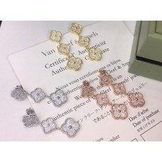 Kolczyki Van Cleef Arpels Magic Alhambra 3 motywy z diamentowym wysadzaniem