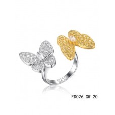 Pierścień Van Cleef Arpels z dwoma motylami między palcami, żółte złoto, okrągłe żółte szafiry