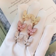 Kolczyki Van Cleef Arpels z dwoma motylami i 70 diamentami w 3 kolorach